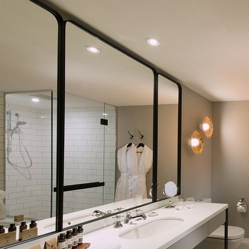 Industrial matte black metal framed vanity mirror