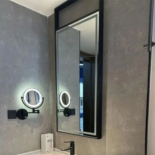 LED backlit vanity mirror with matte black metal framework