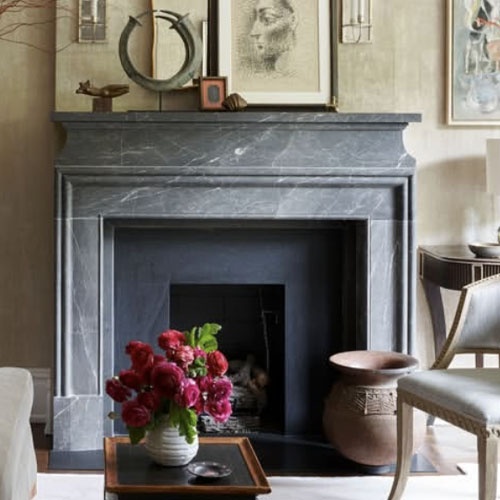 Marble fireplace surround to create a cozy living room