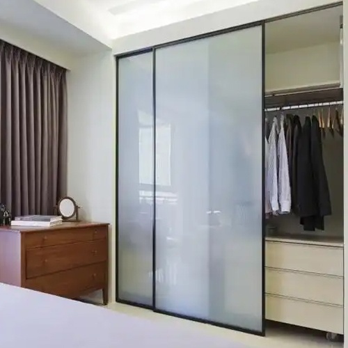 Sliding wardrobe door by frosted glass panel