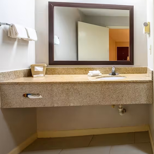 bathroom floating vanities by granite with tissue slot on skirt for red roof inn motel