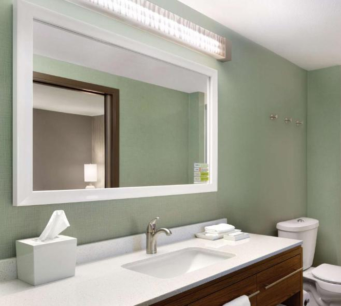 framed vanity mirror in home 2 suites