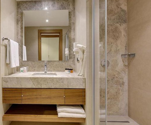 Ramada resort bathroom vanity and mirror fixture