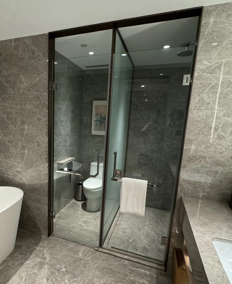 shower partition and door by glass