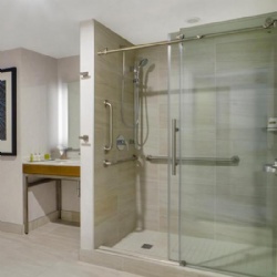 Round track single roller frameless glass shower door for Double Tree Hotel