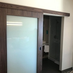 SpringHill Suites Barn Door Walnut Finish