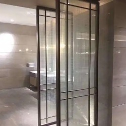 Bathroom glazing wall with fabric laminated glass panel