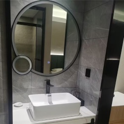 Bespoke bathroom metal framed mirror  with frontlit LED lighting