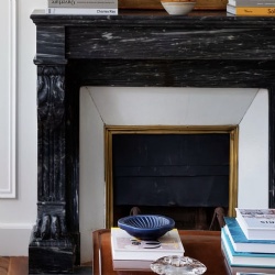 Black marble fireplace mantel