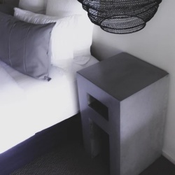 Concrete bedside end table with shelf