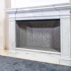 Custom made marble fireplace surrounding panel and molding