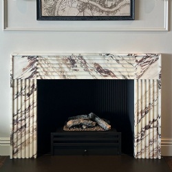 Fireplace mantel in Marble Calaccata Viola Slat Jambs and Frieze