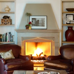 Hotel corner suite living room stone fireplace