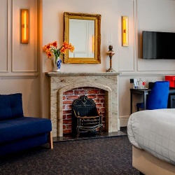 Marble Fireplace Mantel in Hotel Deluxe Rooms