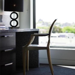 Recycled stone terrazo table furniture in hotel guestroom