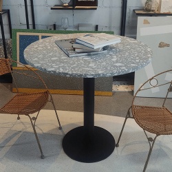 Table with artificial terrazzo stone tops
