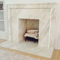 Taj Mahal quartzite modern fireplace surround