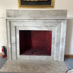 Taj Mahal quarzite fireplace surrounding panel and hearth