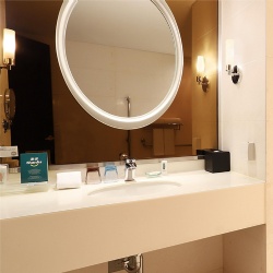 White Quartz Bath Vanities and Round LED Mirror