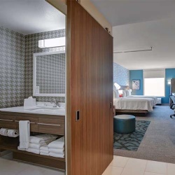 barn doors for hotel guest rooms and suites