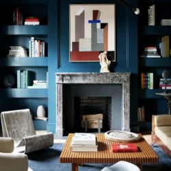 classic fireplace and modern artwork