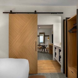 custom sliding barn doors for hotel bathrooms
