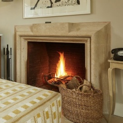 limestone fireplace mantel hotel